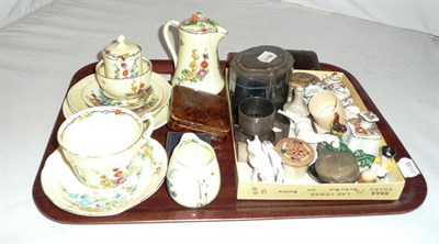 Lot 139 - Four silver napkin rings, a plated tea caddy, a Continental spoon and a quantity of miniature...