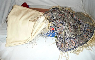Lot 144 - An Indian 'Paisley' wool shawl, two fine cream wool shawls, a fine red wool shawl and two lace...