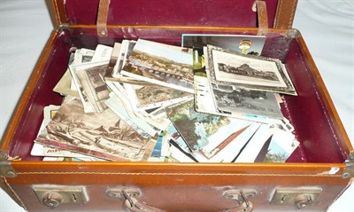 Lot 164 - A leather case containing pre-war postcards, including topography, comic, overseas etc