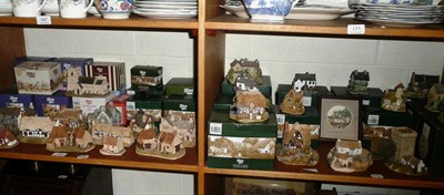 Lot 168 - Two shelves of Lilliput Lane cottages, boxed and loose, including seven boxed "The World of Beatrix
