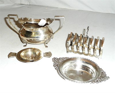Lot 186 - Silver sugar, toast rack, dish and tea strainer