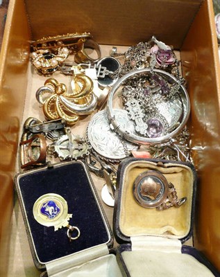 Lot 189 - A 9ct gold and enamel medallion, silver bangle, a locket, a brooch, an Art Nouveau brooch and a...