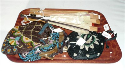 Lot 191 - Three circa 1930's bead work evening purses and eight Japanese fan frames of varying designs