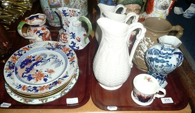 Lot 214 - Two trays of ironstone plates, relief-moulded jugs, etc