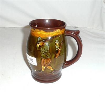 Lot 250 - A Doulton Kingsware golfing mug