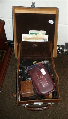 Lot 272 - A Bolex Paillard Model H16 cine camera with accessories and tripod in a leather case, cased...