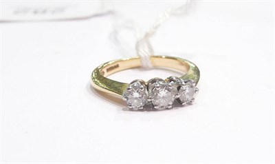 Lot 282 - A three stone diamond ring
