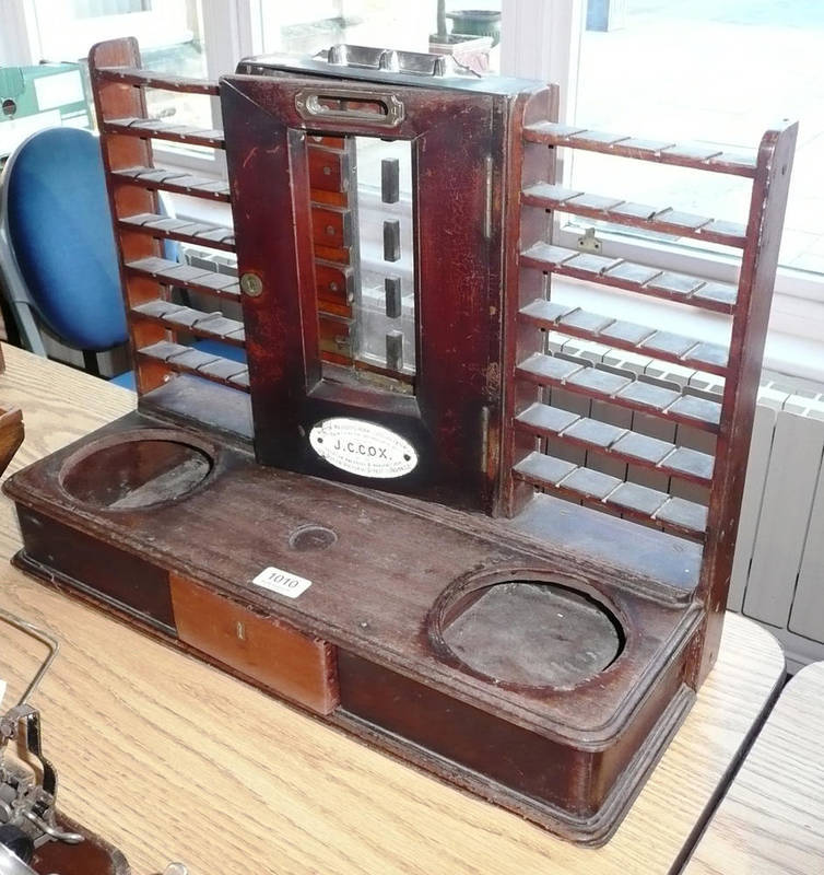 Lot 1010 - A Victorian Mahogany Cox's Patent Till, with brass fittings, and inset with an enamelled plaque...