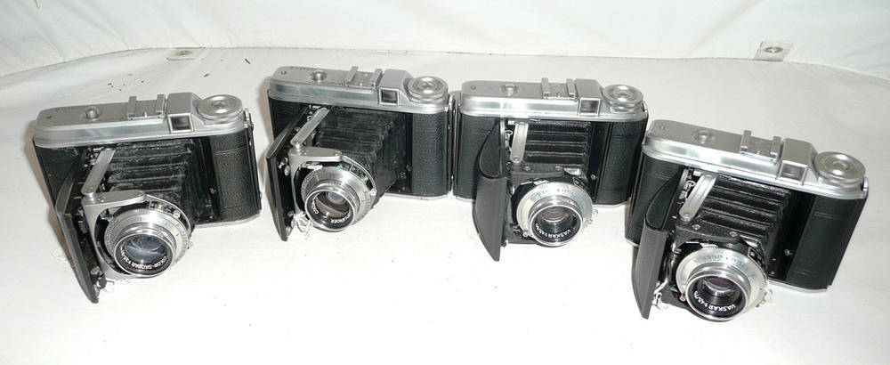 Lot 1100 - Four Voightlander 'Perkeo' Folding Rollfilm Cameras - two Perkeo I's with Vaskar f4.5/50mm lens and