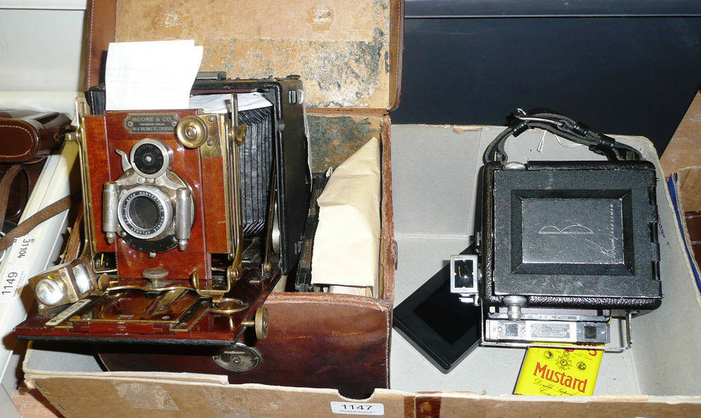 Lot 1147 - A Thornton Pickard Folding Ruby Plate Camera, 3 1/4 x 4 1/4, with black leather covered wooden...