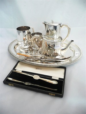 Lot 13 - A quantity of plate including two serving dish, a teapot, a mug, a pair of cased silver lobster...
