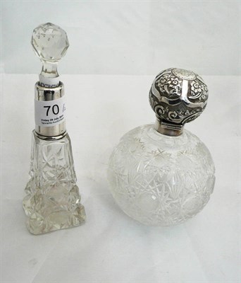 Lot 70 - Two silver mounted scent bottles