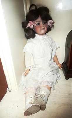 Lot 103 - Armand Marseille 390 large bisque socket head doll, with sleeping blue eyes, later wig, jointed...