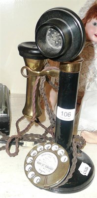 Lot 106 - Brass and ebonised candlestick telephone