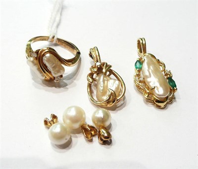 Lot 127 - Two baroque pearl and diamond clip pendants, three cultured pearl pendants and a baroque pearl ring