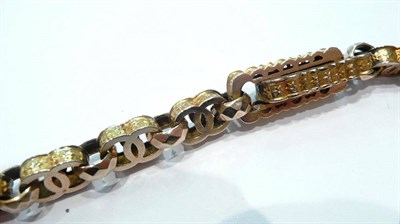Lot 138 - A yellow metal watch chain, the clasp stamped '.375'