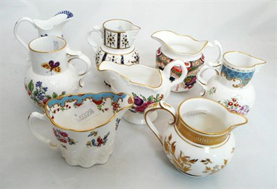 Lot 155 - Eight Royal Worcester jugs in an earlier style