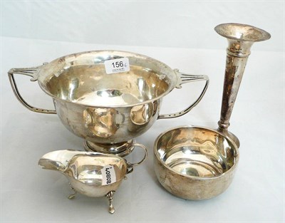 Lot 156 - A silver two-handled bowl, sauce boat and bowl (16oz) and a loaded silver trumpet vase
