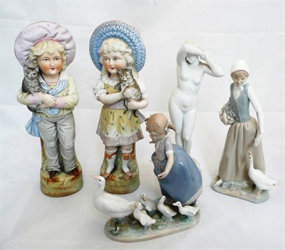 Lot 166 - A pair of bisque figures of Victorian children, a Parian model of a nude maiden, a Lladro model and