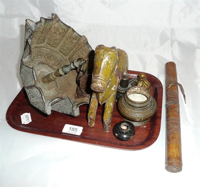 Lot 185 - An antique oil lamp, a painted wooden horse, a small Chinese bronze vase etc