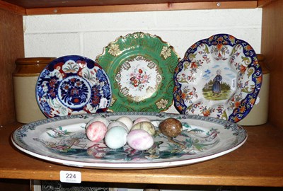Lot 224 - A platter, two storage jars, a Quimper dish, a Davenport dish, an Imari plate and marble eggs