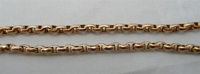 Lot 241 - A 9ct gold muff chain, 28g