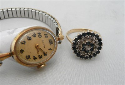 Lot 246 - A sapphire-set cluster ring and a lady's Bulova wristwatch