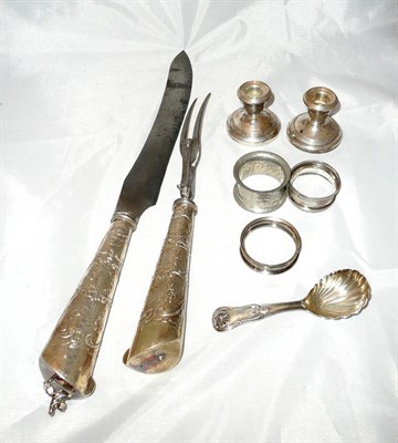 Lot 269 - A pair of meat carvers, the blade stamped Hamilton & Inches, pair of silver dwarf candlesticks, two