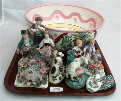 Lot 288 - A copy of a Sunderland lustre bowl, a German Fairing 'Oyster Day', a pair of Naples figures,...