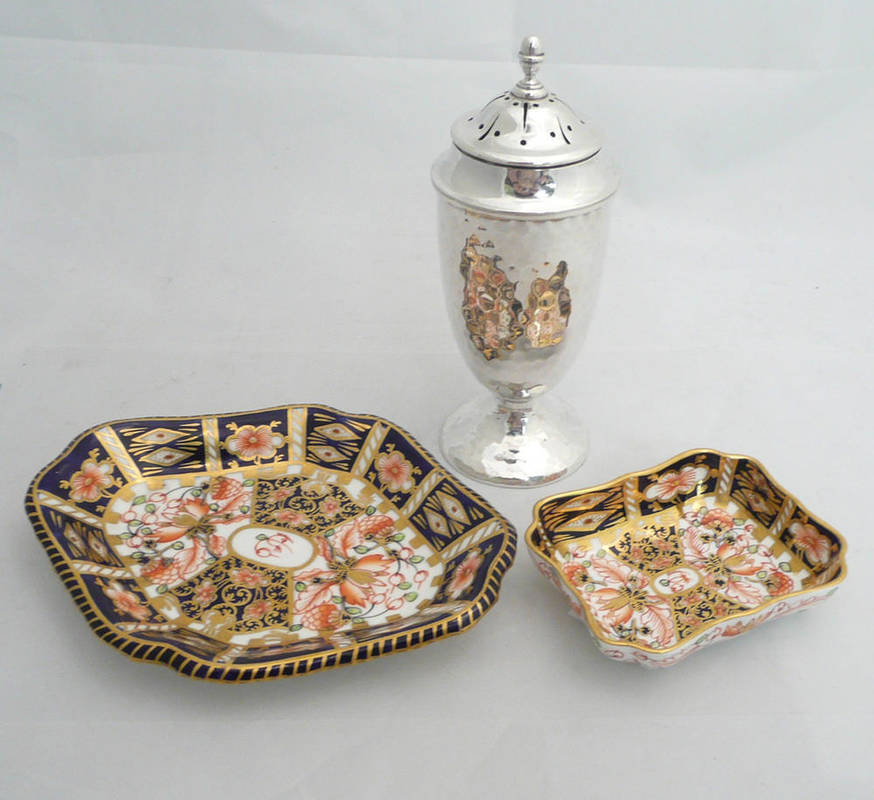 Lot 442 - Silver caster and two Royal Crown Derby dishes
