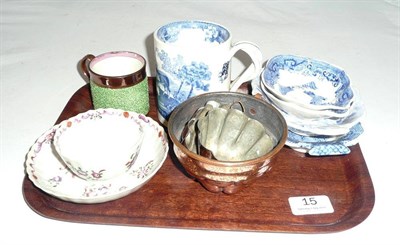 Lot 15 - Three copper moulds, green coffee can, tea bowl and saucer, four small blue and white dishes...