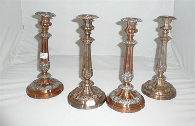 Lot 36 - A set of four Old Sheffield plate candlesticks