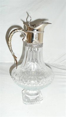 Lot 40 - A claret jug with plated mount