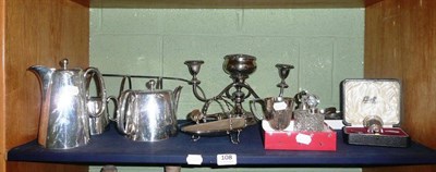 Lot 108 - A silver christening mug, a cased silver egg cup and spoon, a pair of silver-mounted scent bottles