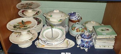 Lot 110 - A shelf of ceramics including dessert services, tureens and covers, tiles etc