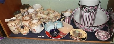 Lot 119 - A shelf of ceramics including a pink and black striped part toilet set, Crown Devon Fielding's...