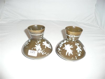 Lot 125 - A pair of George Jones pate-sur-pate vases