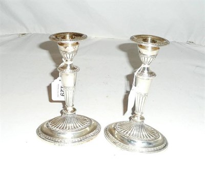 Lot 129 - A pair of loaded silver candlesticks, 1893 (2)