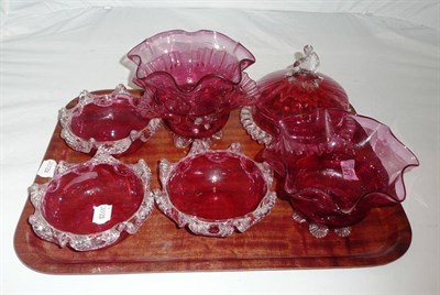 Lot 143 - Tray of six cranberry glass bowls and a powder bowl and cover