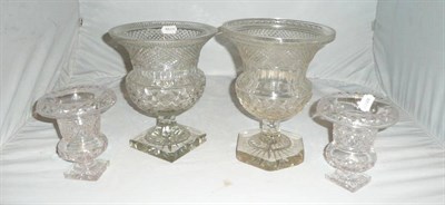 Lot 144 - Four cut glass campana vases