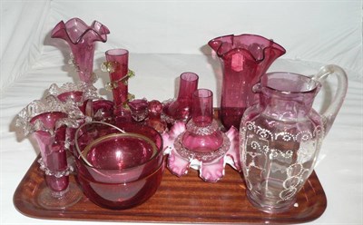 Lot 146 - A tray of sixteen pieces of cranberry glass including vases, jugs, salts, etc