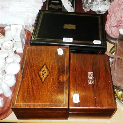 Lot 154 - Two rosewood sewing boxes and an ebonised box