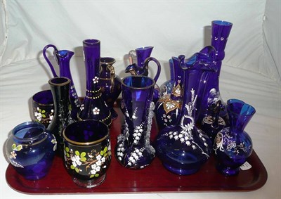 Lot 174 - A quantity of decorated blue glass, including jugs, vases, etc.