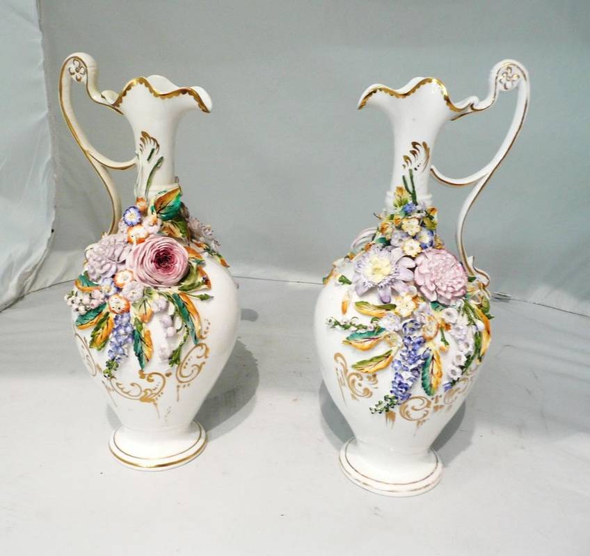 Lot 177 - Pair of Coalbrookdale ewers (restored)