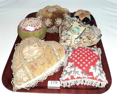 Lot 179 - Tray of two World War I heart-shaped pin cushions and four other pin cushions