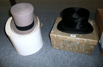 Lot 187 - Harrods silk top hat and a Lock grey topper in card boxes