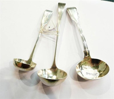 Lot 223 - Two Scottish silver toddy ladles and a Victorian silver sauce ladle