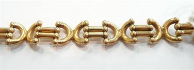 Lot 229 - A fancy bracelet stamped '375'