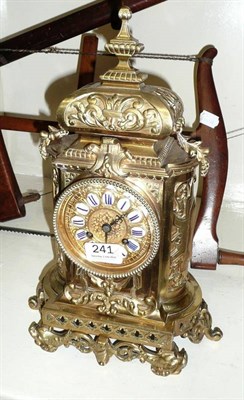 Lot 241 - A brass mantel clock and a light fitting