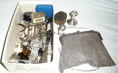 Lot 245 - A box of miscellaneous items including mesh purse, candlesticks, perpetual calendar etc